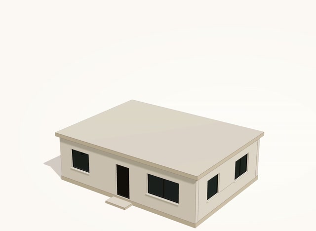 Existing single-storey reinforced concrete house with a flat roof, before the floor addition